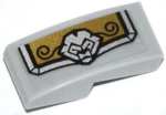 11477pb003L - Slope, Curved 2 x 1 x 2/3 with Gold and Silver Armor Plate with Lion Head and Black Swirls Pattern Model Left Side (Sticker) - Set 70123