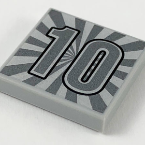 3068bpb1321 - Tile 2 x 2 with Groove with Silver Number '10' and Radiating Beams Pattern