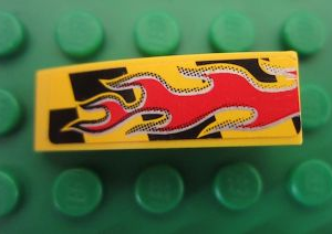 50950pb027L - Slope, Curved 3 x 1 with Red Flames on Black and Yellow Pattern Model Left (Sticker) - Set 8644
