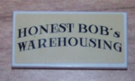 87079pb0026 - Tile 2 x 4 with 'HONEST BOB's WAREHOUSING' on Tan Background Pattern (Sticker) - Set 8199