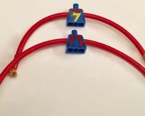 28602pb01c02 - Torso, Modified Female Red Scarf and Yellow Lightning Bolt Pattern / Red Long Rubber Arms with 1 Pearl Gold Cuff Pattern / Medium Nougat Hands